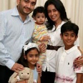 Ami Modi with her husband and children