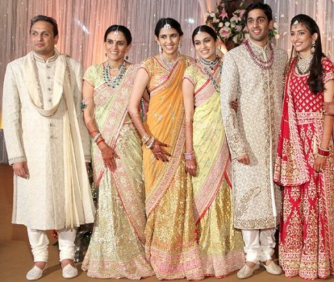Russell Mehta with his wife daughters, son and daughter-in-law