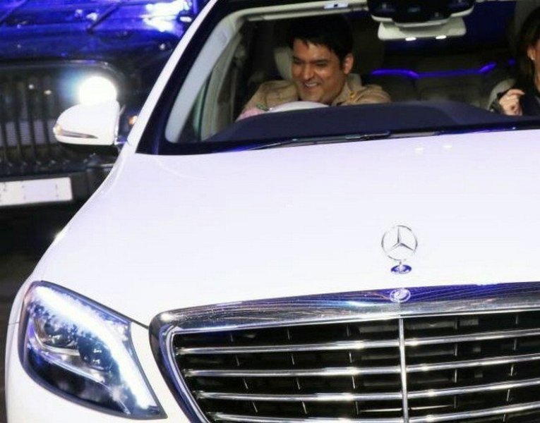 Kapil Sharma driving his Mercedes car