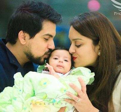 Pushkar Jog with his wife and daughter