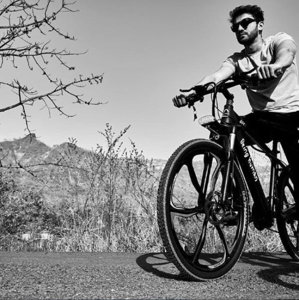 Zaheer Iqbal riding his bicycle