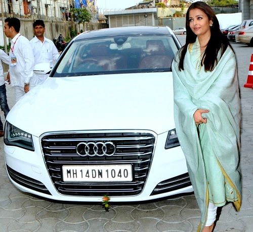 Aishwarya Rai Bachchan poses with her Audi A8 car