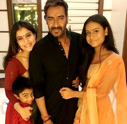 Ajay Devgn with his wife Kajol and children