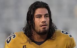 Roman Reigns in his youth playing football