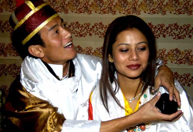 Baichung Bhutia with his wife