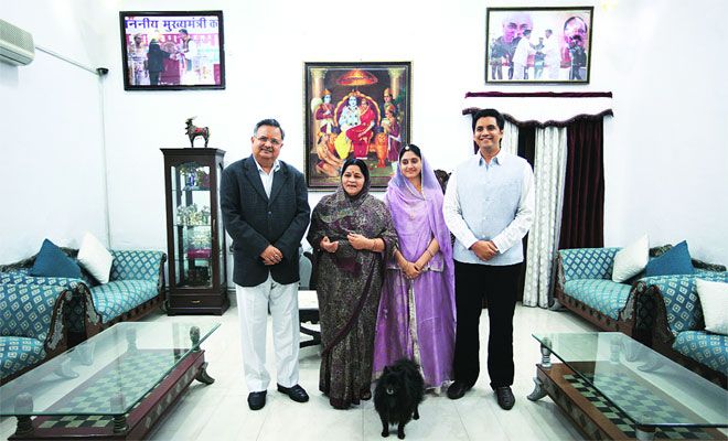 Raman Singh with his wife, son and daughter in law