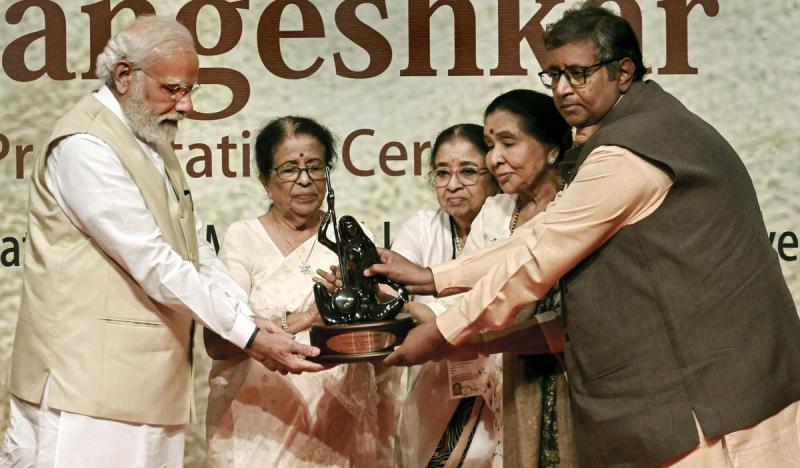 Prime Minister Narendra Modi receives the first Lata Deenanath Mangeshkar Award in Mumbai on 24 April 2022