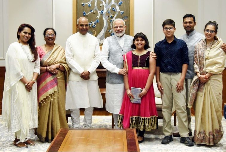 Ram Nath Kovind with his daughter (extreme left), wife (left), son(right), daughter-in-law (extreme right) and grandchildren along with PM Narendra Modi