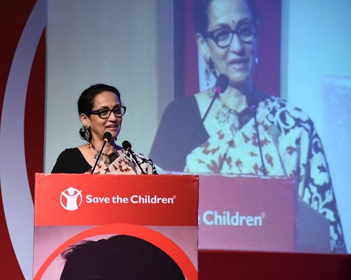 Swaroop Sampat giving a speech at NGO- Save the Children India