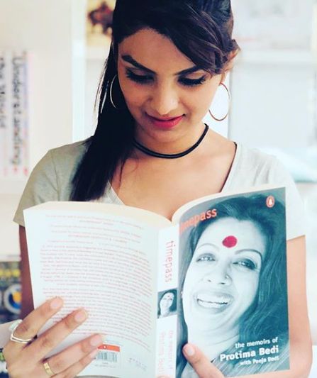 Anveshi Jain reading a book