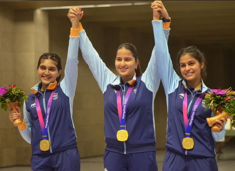 Manu Bhaker (right) with her team after winning the gold medal at the 2023 Asian Games