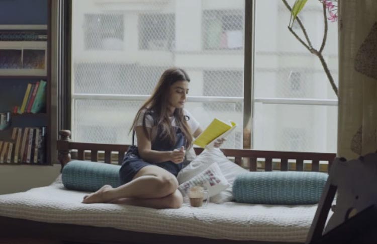 Radhika Apte reading a book