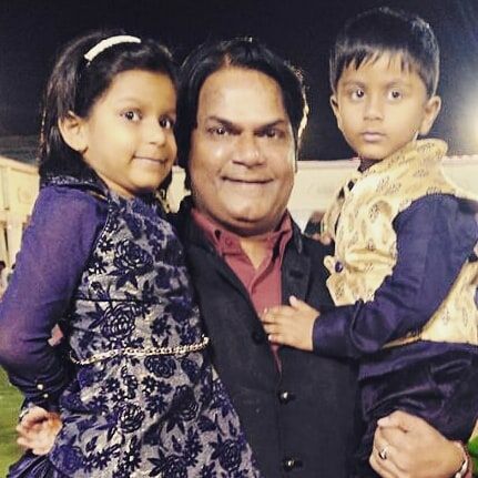 Akhilendra Mishra with his son and daughter