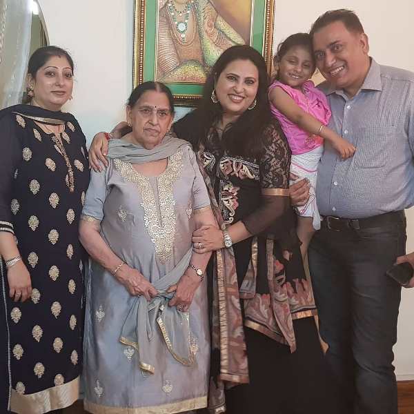 Nilu Kohli with her mother and brother