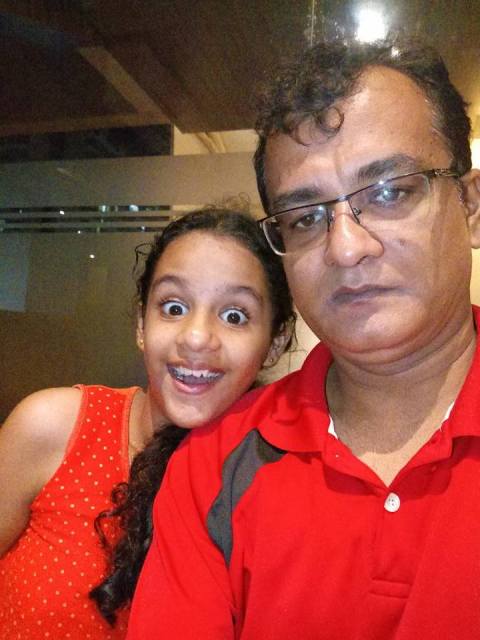 Syna Anand with her father