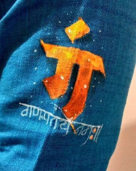 a shirt's sleeve painted by Akshay Kelkar