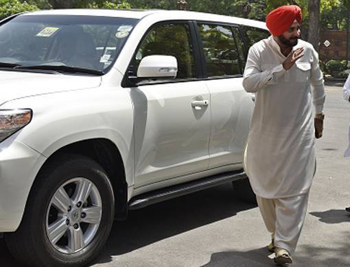 Navjot Singh Sidhu with his car