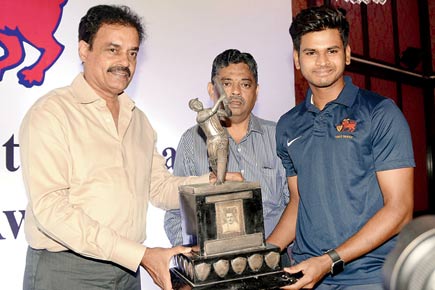 Shreyas Iyer with S V Rajadyaksha trophy