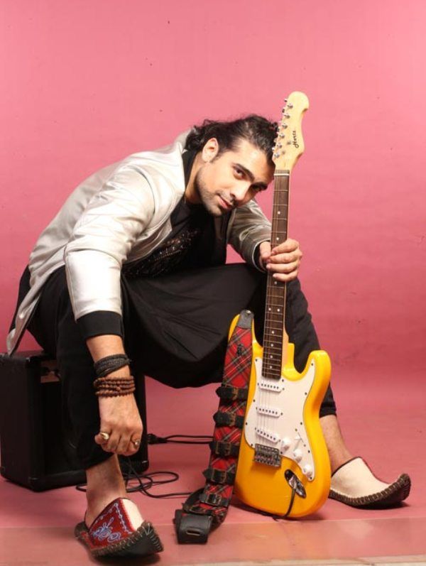 Jubin Nautiyal Posing With Guitar