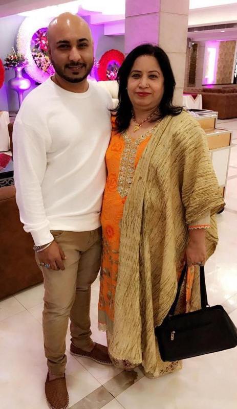 B Praak with his mother