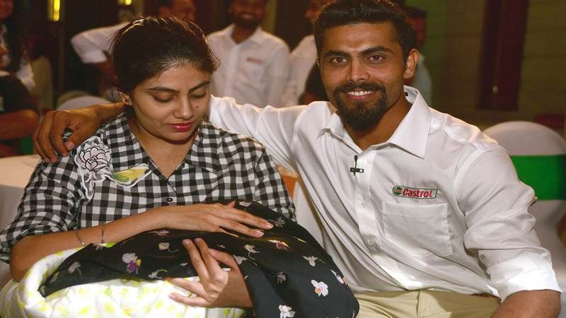 Ravindra Jadeja with his wife and daughter
