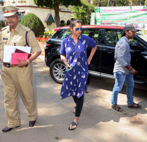 Sania Mirza coming out of her Range Rover car
