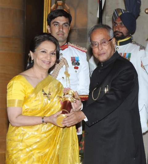 Sharmila Tagore receiving the Padma Bhushan from the President of India