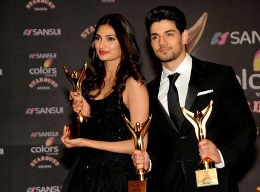 Athiya Shetty and Sooraj Pancholi with awards