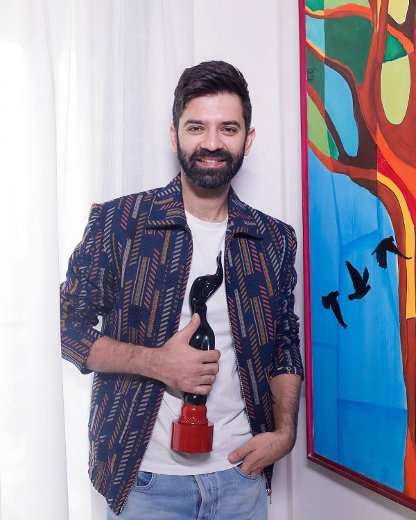 Barun Sobti with the Best Supporting Actor (Male) award, which he won at the 2023 Filmfare OTT Awards