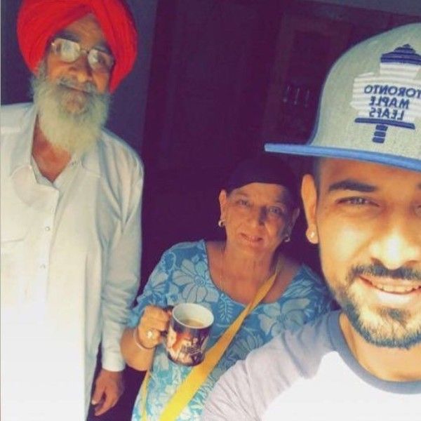 Garry Sandhu with his parents