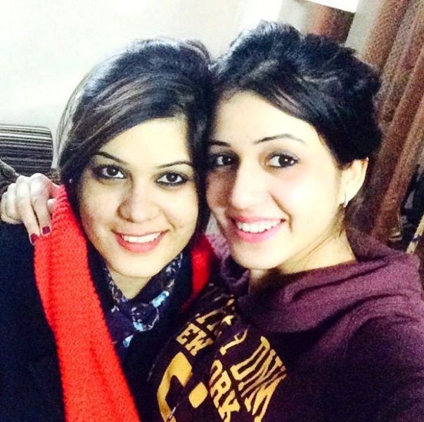 Isha Rikhi with her sister