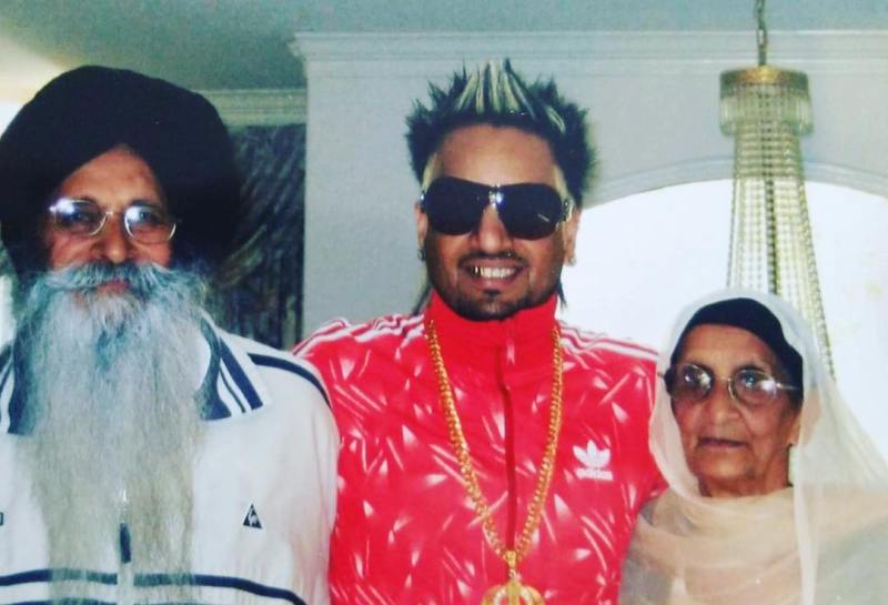 Jazzy B with his parents