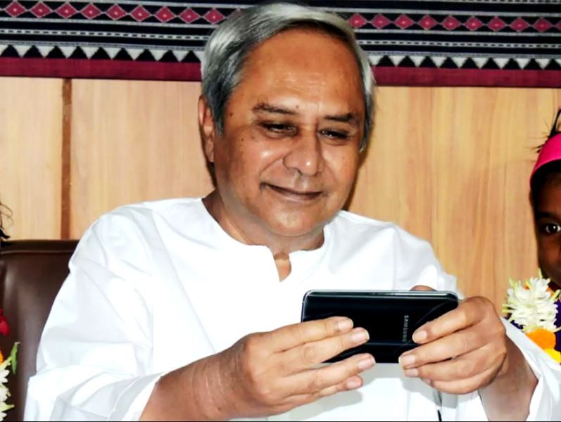 Naveen Patnaik Using A Mobile Phone
