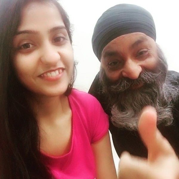 Asees Kaur with her father