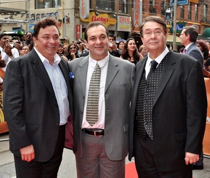 From leftArmaan Jain's Maternal Uncles, Rishi Kapoor, Rajiv Kapoor and Randhir Kapoor, all sons of famed Bollywood star Raj Kapoor, stand for a photo on the Red Carpet during the Raj Kapoor Family Tribute event during the iifa Film Festival at the TIFF Bell Light Box in Toronto on Sunday, June 26, 2011. (AP Photo/The Canadian Press, Aaron Vincent Elkaim)