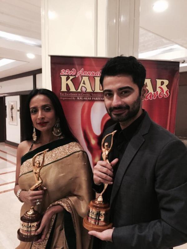 Harshad Arora posing with an Award
