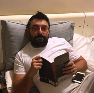 Arvind Swami Reading a Book