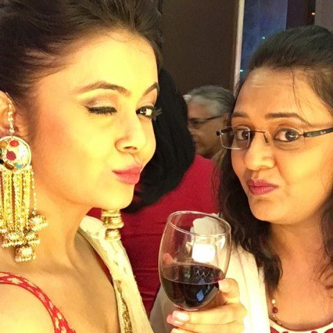 Devoleena Bhattacharjee with a glass of wine