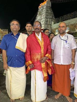 K Sivan while visiting a temple