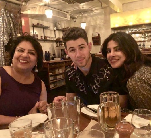 Madhu Chopra with her daughter and son-in-law