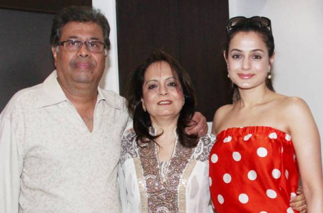Ameesha Patel with her parents