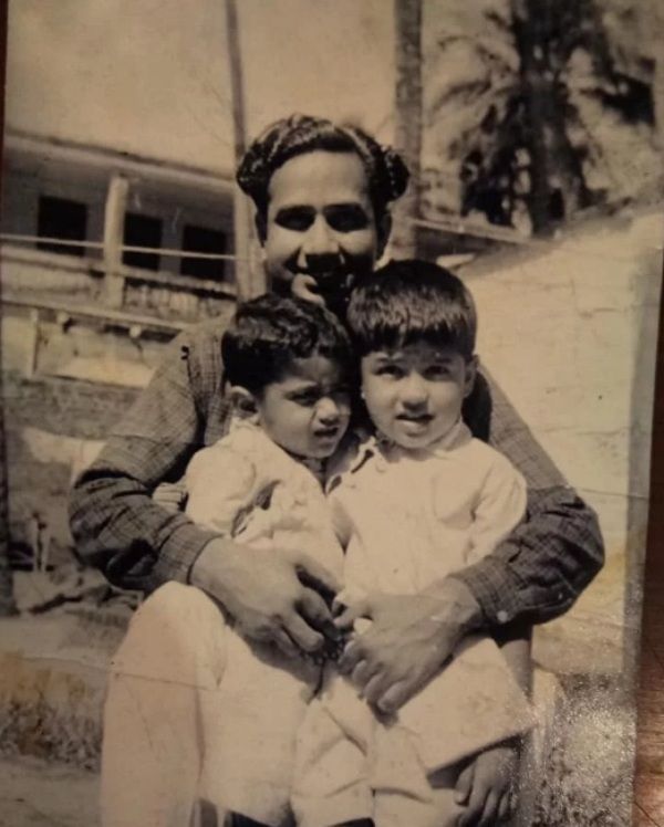 Childhood Photo of Abu Malik with his brother and father
