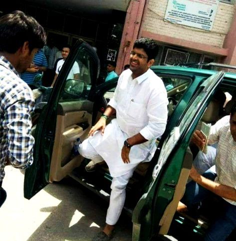 Dushyant Chautala stepping out of his car