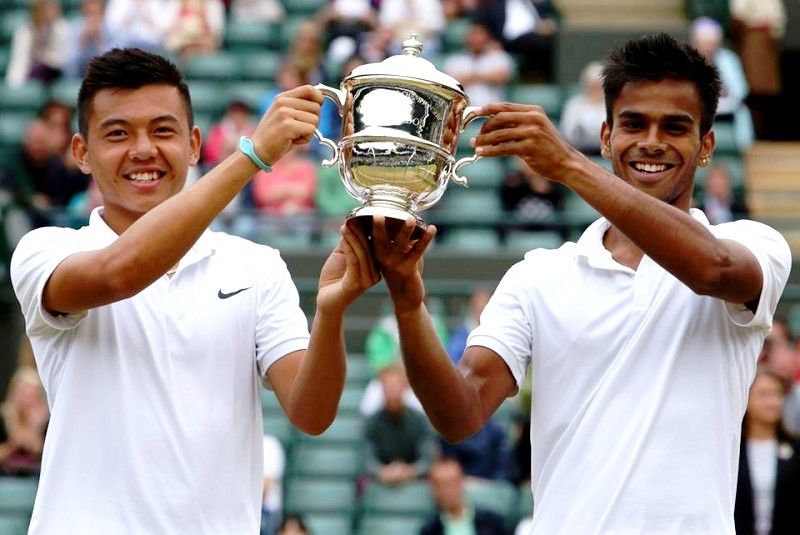 Sumit Nagal with Lý Hoàng Nam after winning the Boys' Doubles at Wimbledon