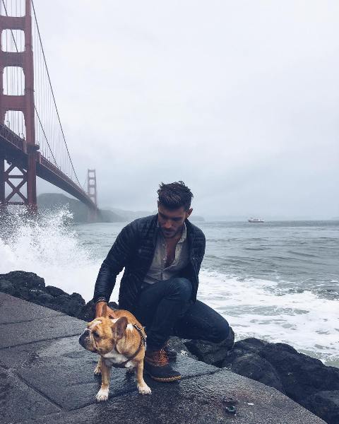 Corry Tran with his pet dog Buddha