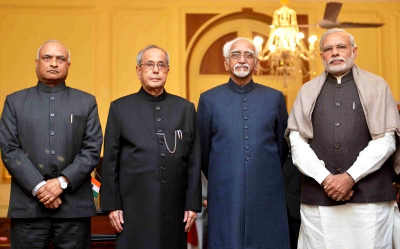From left to right: RK Mathur, Pranab Mukherjee, Hamid Ansari, and Narendra Modi