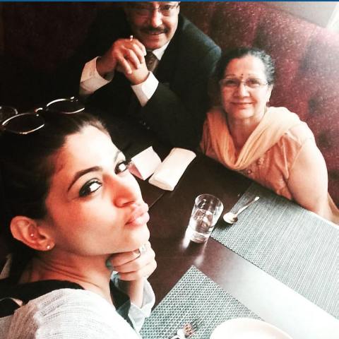 Reyhna Malhotra with her parents