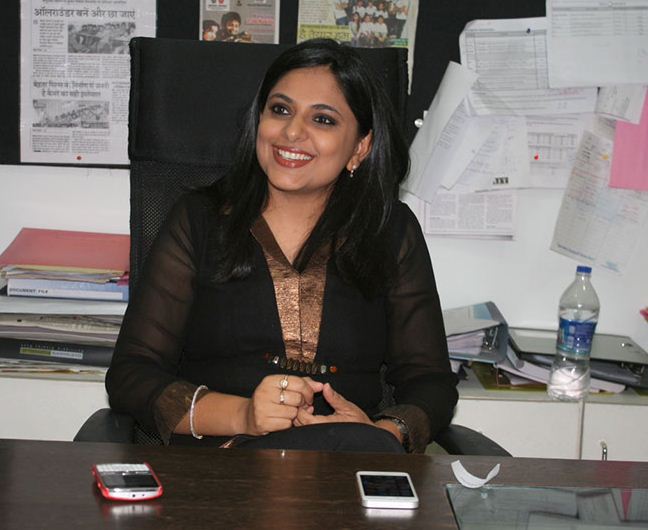 Richa Anirudh sitting in her office