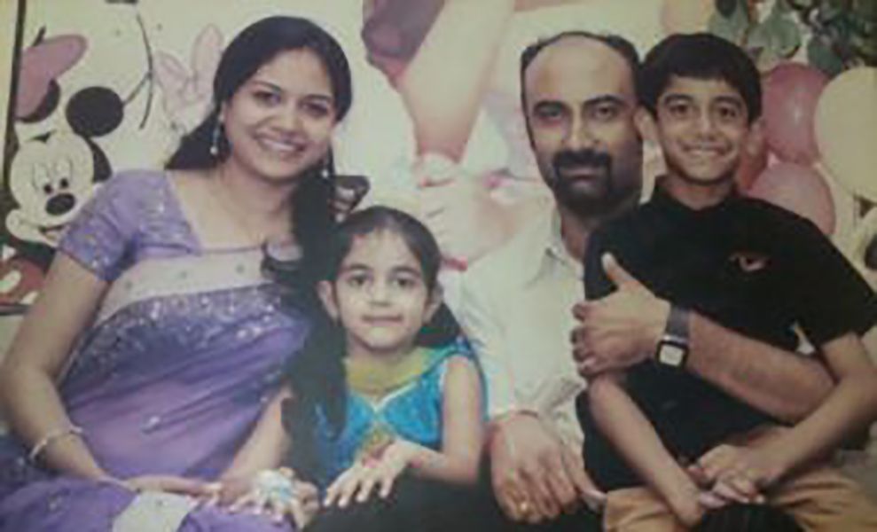 Sunitha Upadrashta with her husband and children