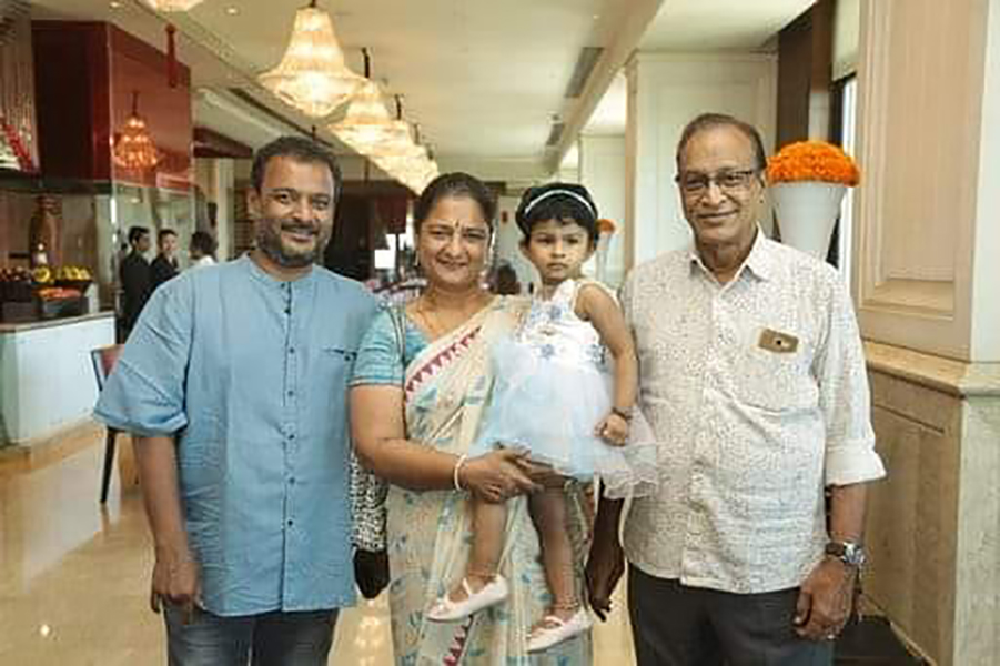 Vijaya Chamundeswari with her husband, son, and granddaughter